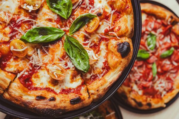 a close up of a pizza on a plate
